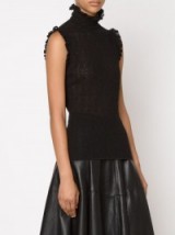 ALEXANDER MCQUEEN Victorian lace knit top in black. Luxe fashion | designer knitted tops | high ruffled neck | ruffle trim  #