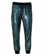 ASHISH Sequinned Joggers with Lace Inserts. Designer jogging pants | sequined | sequin embellished | sports trousers | casual luxe