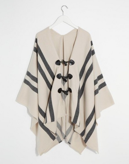 Front fastening cream cape with stripe panel from ASOS. Autumn / winter fashion – capes – womens jackets - flipped