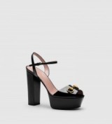 Mariah Carey wore a pair of these gorgeous black patent platform sandals from Gucci for a night out in Portofino, Italy, 2 September 2015…love the 70s look. Find them at gucci.com. Celebrity fashion | star style | designer shoes | 70’s vintage style