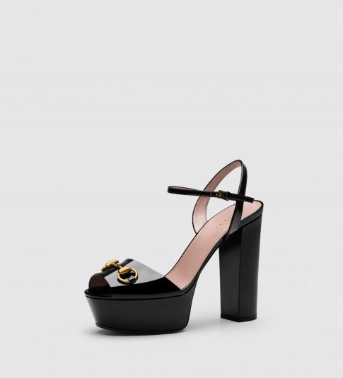 Mariah Carey wore a pair of these gorgeous black patent platform sandals from Gucci for a night out in Portofino, Italy, 2 September 2015…love the 70s look. Find them at gucci.com. Celebrity fashion | star style | designer shoes | 70’s vintage style - flipped