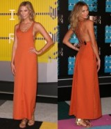 Model Karlie Kloss at the MTV Video Music Awards in LA, 31 August 2015, wearing a terracotta orange maxi dress with crossover back detail, studded with gold diamond shaped hardwear, from Louis Vuitton Resort 2016 and finished off her look with gold, flat strappy sandals. Celebrity fashion | star style | events | designer gowns
