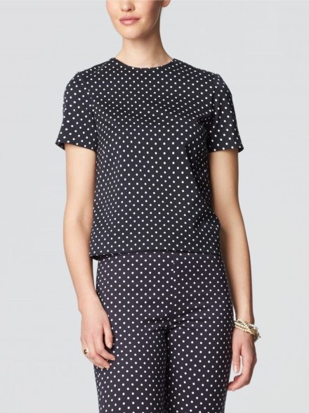 Reese Witherspoon was spotted wearing one of these navy Draper James Nashville shirts, covered in white polka dots, with a pair of skinny jeans and red high heeled pumps in Los Angeles, 2 September 2015 . Celebrity fashion | star style | what celebrities wear - flipped