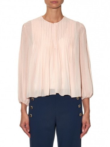 Worn with a pair of 70s style flares, this Chloe pleated silk blouse is perfect for creating a look of boho chic. Designer blouses | vintage style tops | bohemian looks | pale pink - flipped