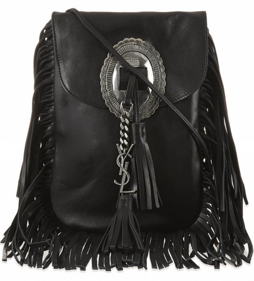 For the perfect boho chic look, want this Saint Laurent Anita tasselled flat bag in black…Kourtney Kardashian owns one in tan suede! Designer bags / fringed handbags / celeb style accessories