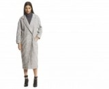 NEON ROSE Blanket Cocoon Coat in grey – as worn by Gigi Hadid at a New York Rangers Game, 10 October 2015. Celebrity fashion | star style | warm winter coats | what celebrities wear