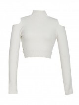 Jonathan Simkhai Cutout Turtleneck in Ivory – as worn by Gigi Hadid out in Paris, 1 October 2015. Celebrity fashion | designer crop tops | star style | what celebrities wear
