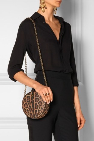 DOLCE & GABBANA Glam leopard-print faux leather shoulder bag. Animal prints – round bags – designer handbags – glamorous accessories - flipped