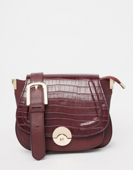 Luxe style accessories…Dune Delphine Croc Effect Winged Saddle Bag in Berry. Luxury looks ~ faux leather handbags ~ shoulder bags