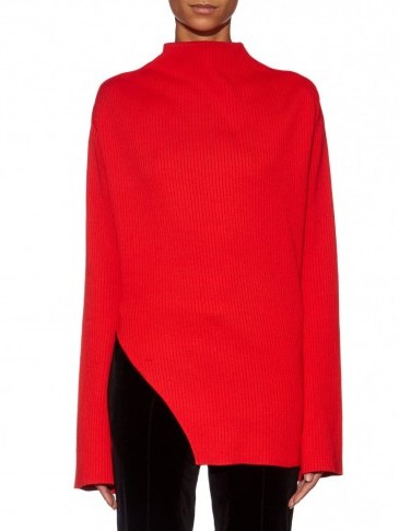 THOMAS TAIT Flared-sleeve ribbed-knit sweater in red. Designer knitwear | asymmetric jumpers | luxury sweaters | knitted fashion - flipped