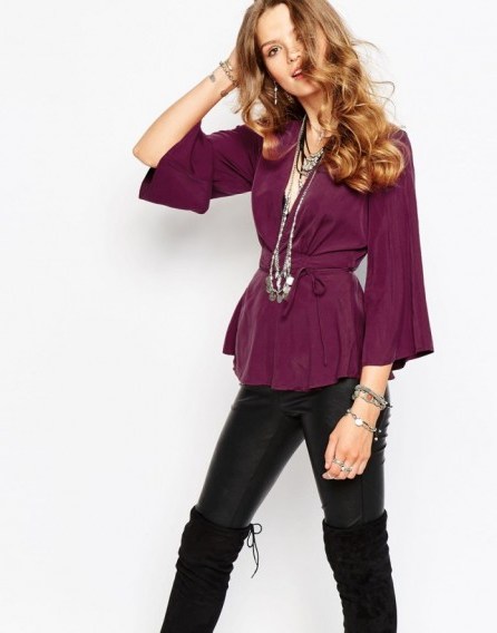 Free People Grand Piano Wrap Top with Peplum Detail in mulberry. Plunge neckline tops | waist tie blouses - flipped
