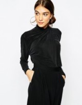 Ganni Knot Front Top in Cupro in black. Womens tops | high neck | wrap front