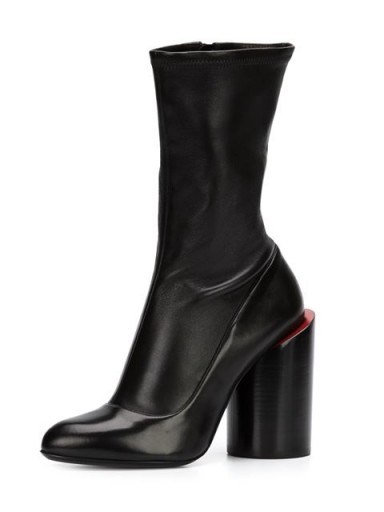 GIVENCHY sculpted heel boots black – as worn by Kendall Jenner with an oversized tee, attending an event at Saks Fifth Avenue in Beverly Hills, California, 30 October 2015. Celebrity fashion | star style | designer footwear | what celebrities wear - flipped