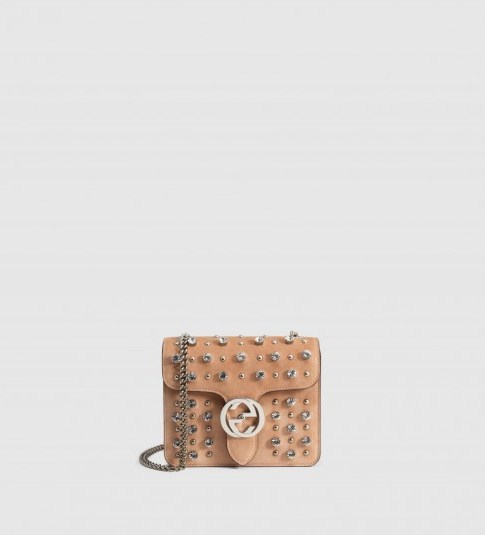 Gucci interlocking studded suede shoulder bag rose beige. Designer handbags | luxe bags - flipped