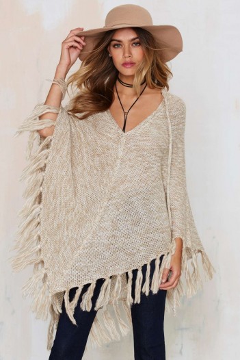 Nasty Gal Knitflix and Chill Poncho beige. Womens ponchos | knitted outerwear | asymmetric fringe hem | knitwear