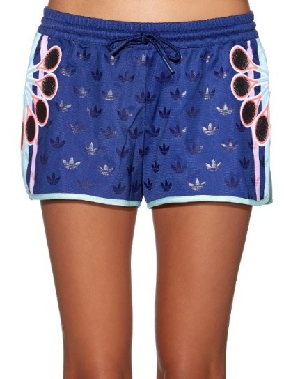 Kylie Jenner style…Adidas X Mary Katrantzou ori logo-print shorts – as worn by Kylie Jenner at her home in Calabasas, October 2015. Celebrity Fashion | star style | what celebrities wear | sports luxe outfits - flipped