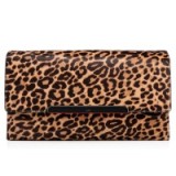 Christian Louboutin Rougissime Clutch Jaguar Print – as carried by Demi Lovato out in New York, 15 October 2015. Celebrity fashion | star style | designer evening bags | what celebrities carry / wear