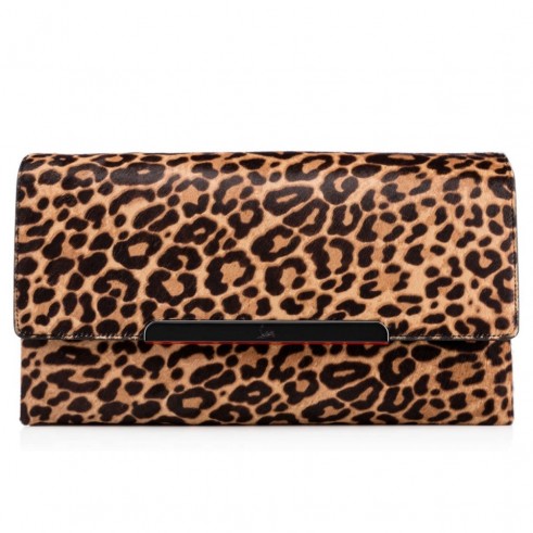 Christian Louboutin Rougissime Clutch Jaguar Print – as carried by Demi Lovato out in New York, 15 October 2015. Celebrity fashion | star style | designer evening bags | what celebrities carry / wear