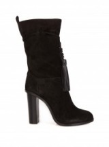 LANVIN Tassel-tie slouchy suede boots black – as worn by Kate Upton out in New York City, 30 October 2015. Celebrity fashion | star style | designer slouch boots | mid calf length | what celebrities wear