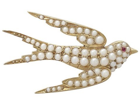 Victorian seed pearl and ruby 15ct yellow gold Swallow brooch. Bird brooches – antique jewellery - flipped