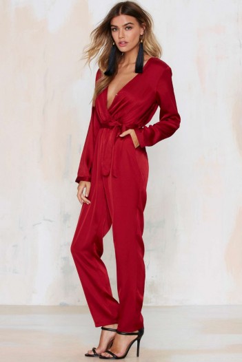 WYLDR Sophie plunging satin jumpsuit burgundy. Party fashion – occasion jumpsuits – evening glamour – going out