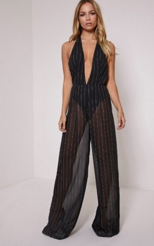 Pretty Little Thing – Mina Pinstripe sheer plunge halterneck jumpsuit. Plunging necklines | deep v neckline | low cut jumpsuits | party fashion | going out glamour - flipped