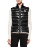 Moncler Ghany Zip Puffer Vest in black – as worn by Olivia Palermo out walking her dog in New York City, December 2015. Celebrity fashion | casual star style | shiny gilets | what celebrities wear | sleeveless jackets | designer body warmers