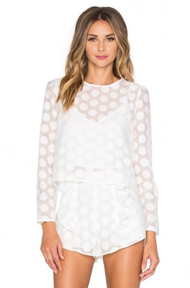 LINE & DOT Soleil Dot Blouse & Shorts in white – as worn by Sarah Hyland hosting the Minnie Rocks the Dots Art and Fashion Exhibit on 22 January 2016 in Los Angeles. Celebrity fashion | star style | tops and shorts sets | co-ords | what celebrities wear to events - flipped