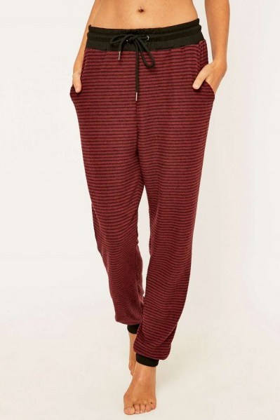 Out From Under Cosy Striped Joggers in maroon. Womens joggers | leisurewear | sportswear | sports pants | casual fashion | jogging bottoms - flipped