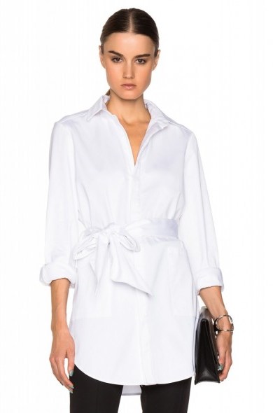 SALLY LAPOINTE STRETCH COTTON OVERSIZED SHIRT WITH WRAP BELT in white. Casual chic | elegant style | designer shirts - flipped