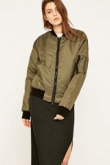 Urban Renewal Vintage Surplus MA1 Olive Bomber Jacket in green. On trend jackets – casual fashion