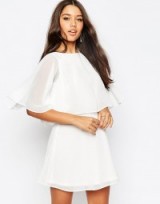ASOS Crop Cape Mini Skater Dress white. Semi sheer party dresses – short length – going out fashion