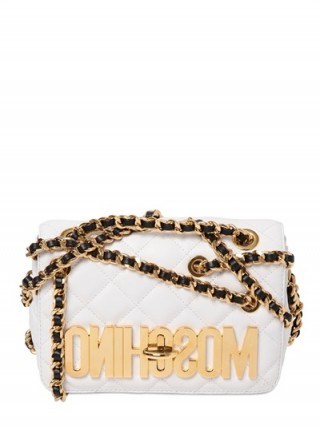 MOSCHINO CHAINED QUILTED LEATHER SHOULDER BAG in white – as worn by Nicky Hilton at Jeremy Scott Winter 2016 during New York Fashion Week, 15 February 2016. Celebrity fashion | star style | what celebrities wear / carry | designer bags | handbags - flipped