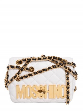 MOSCHINO CHAINED QUILTED LEATHER SHOULDER BAG in white – as worn by Nicky Hilton at Jeremy Scott Winter 2016 during New York Fashion Week, 15 February 2016. Celebrity fashion | star style | what celebrities wear / carry | designer bags | handbags