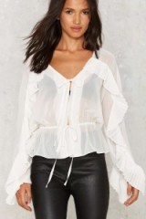 Nasty Gal In the Wings Sheer White Top. Ruffled tops | ruffle blouses | feminine shirts | on-trend fashion