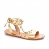 Loeffler Randall Starla Ankle Wrap Sandal in Pale Gold Leather. Flat summer sandals – holiday shoes – chic accessories – embellished with stars – ties – wraps