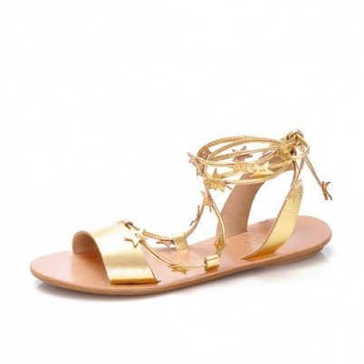 Loeffler Randall Starla Ankle Wrap Sandal in Pale Gold Leather. Flat summer sandals – holiday shoes – chic accessories – embellished with stars – ties – wraps - flipped