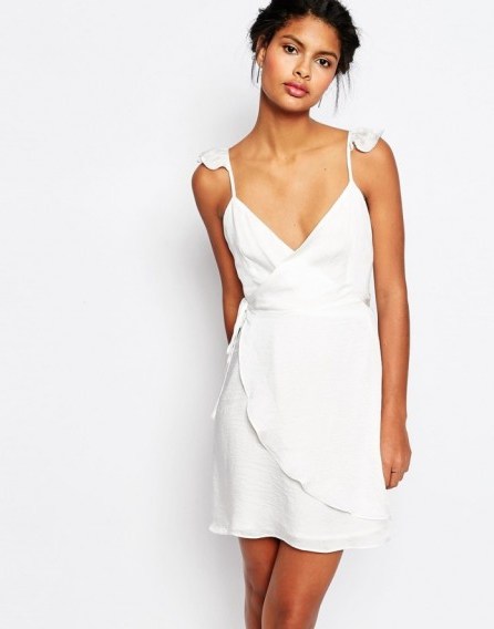 Wyldr Wrap Front Tea Dress with Frills in white. Low cut | plunge front | plunging party dresses | going out | evening fashion - flipped