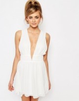 Oh My Love Grecian Plunge Mini Dress in white. Low cut party dresses | deep V necklines | plunging front going out fashion