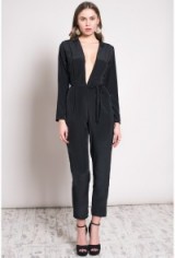 Oh My Love Plunge Long Sleeve Jumpsuit With Tie Black. Plunge front jumpsuits | going out fashion | evening wear | deep V necklines | plunging neckline | party clothing