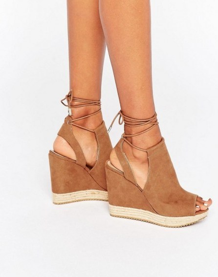 Call It Spring Wirewiel Wedge Sandal With Wrap Around Lace in cognac. Faux suede wedges | wedge heel | summer shoes | holiday high heels | ankle wraps | tan brown - flipped
