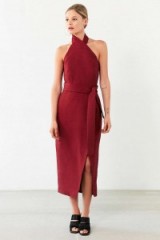C/meo Collective Stand Still Dress in maroon – in the style of Jennifer Lopez (different colour) out in New York, 20 June 2016. Celebrity fashion | star style dresses | wrap around halter | dark red
