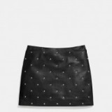 COACH ~ STAR stud leather mini skirt – as worn by Charli XCX on Instagram, 24 June 2016. Celebrity skirts | star style fashion