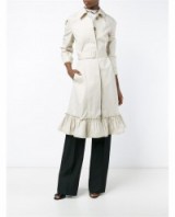 J.W.ANDERSON Ruffle Trench Coat beige ~ designer rain coats ~ feminine style ~ ruffled hemline ~ ruffles ~ statement macs
