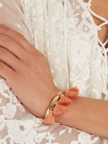 MARTE FRISNES Raquel gold-plated tassel cuff terracotta pink. Designer fashion jewellery | tassels | tasseled cuffs | bracelets | orange tones | summer accessories | holiday jewelry - flipped