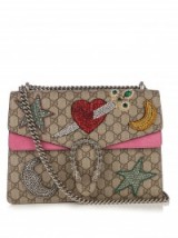 GUCCI Dionysus GG Supreme embellished shoulder bag. Luxe accessories – designer handbags – luxury bags – chain strap