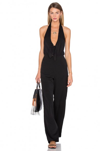 HOUSE OF HARLOW 1960 X REVOLVE COCO TIE FRONT JUMPSUIT in black. Front plunge sleeveless jumpsuits | chic summer fashion | warm holiday evenings | deep V neckline | elegant day wear | plunging necklines