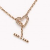 Tommy Hilfiger signature necklace. Designer fashion jewelry | rose gold tone necklaces | embellished heart jewellery | hearts