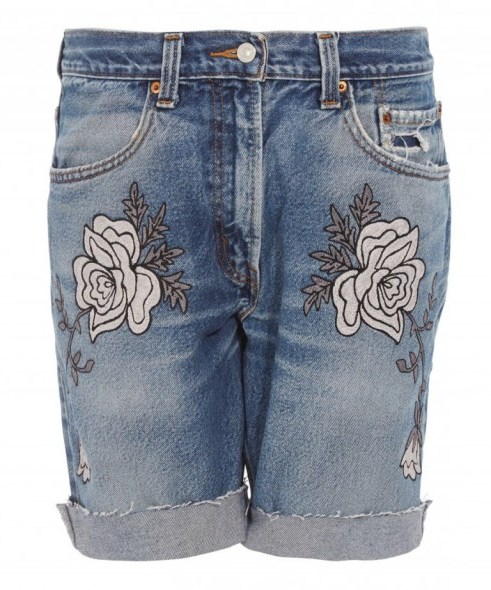 BLISS AND MISCHIEF LIGHT WASH DENIM SHADOW FLOWER EMBROIDERED SHORTS. Blue denim | floral embroidery | cut offs - flipped