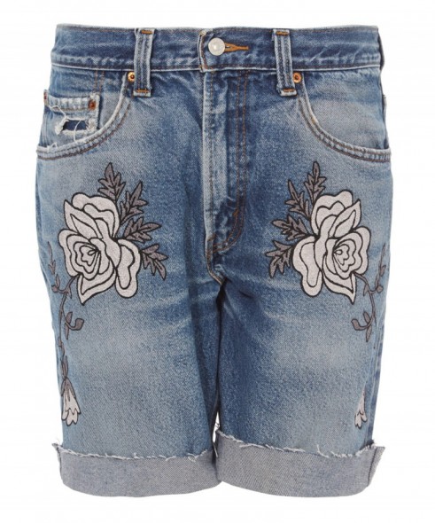 BLISS AND MISCHIEF LIGHT WASH DENIM SHADOW FLOWER EMBROIDERED SHORTS. Blue denim | floral embroidery | cut offs